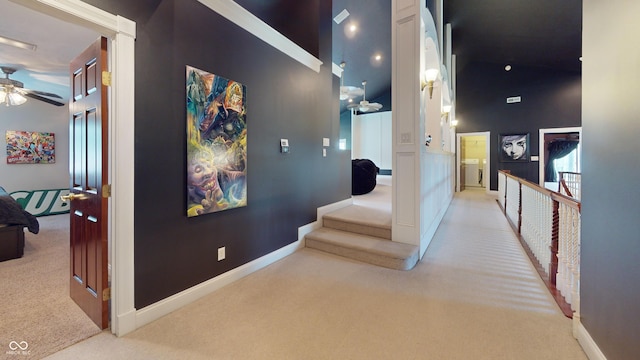 3306 Mullinix Rd, Greenwood, IN 46143 - hallway with carpet floors and high vaulted ceiling