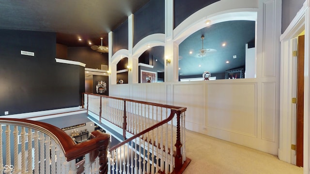 3306 Mullinix Rd, Greenwood, IN 46143 - stairway featuring carpet floors and arched walkways
