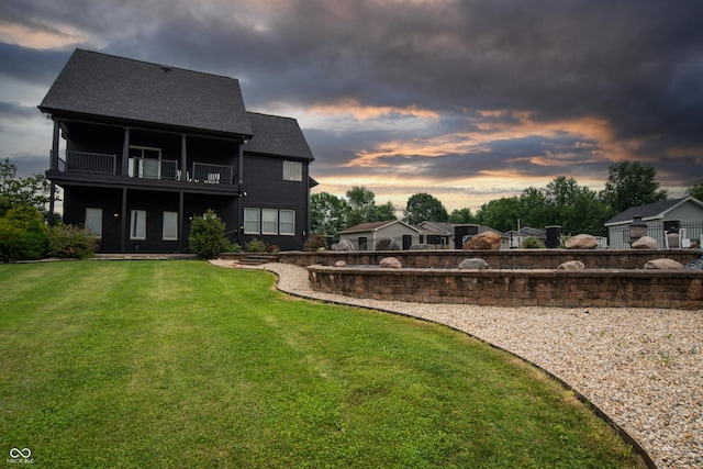 3306 Mullinix Rd, Greenwood, IN 46143 - back of property featuring a balcony, a yard, and a shingled roof