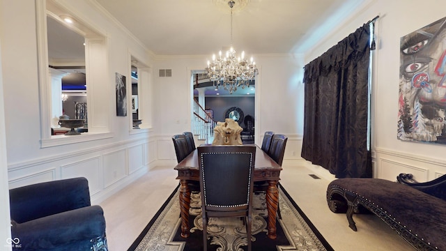 3306 Mullinix Rd, Greenwood, IN 46143 - dining room with a decorative wall, a chandelier, ornamental molding, stairway, and a wainscoted wall