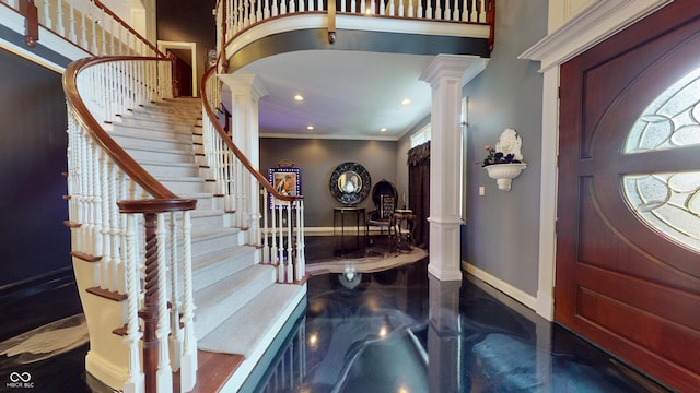 3306 Mullinix Rd, Greenwood, IN 46143 - foyer with decorative columns, stairway, a high ceiling, crown molding, and recessed lighting