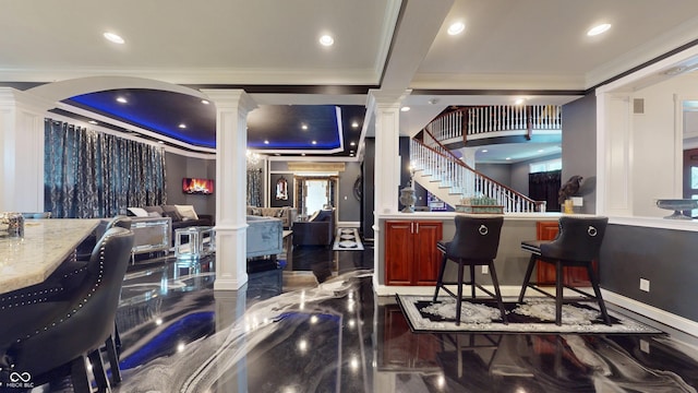 3306 Mullinix Rd, Greenwood, IN 46143 - bar area featuring ornate columns, ornamental molding, recessed lighting, and stairway