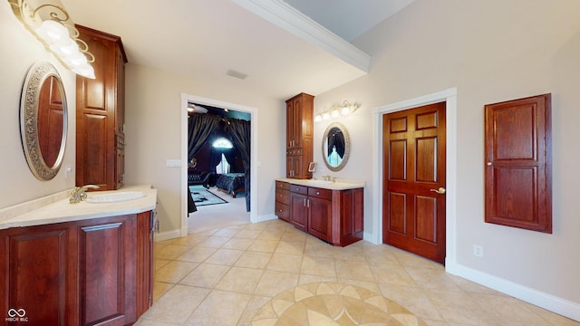 3306 Mullinix Rd, Greenwood, IN 46143 - bathroom featuring two vanities and tile patterned floors