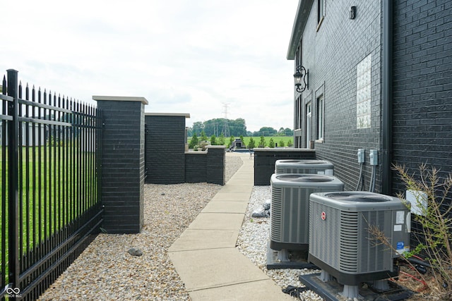 3306 Mullinix Rd, Greenwood, IN 46143 - exterior view of a cooling unit and brick siding