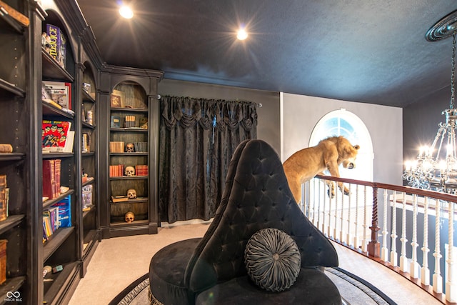 3306 Mullinix Rd, Greenwood, IN 46143 - sitting room featuring carpet flooring and a chandelier