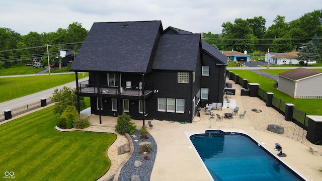 3306 Mullinix Rd, Greenwood, IN 46143 - back of property featuring a patio area, roof with shingles, and a balcony