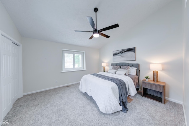 8178 Foxchase Cir, Indianapolis, IN 46256 - carpeted bedroom featuring lofted ceiling, a ceiling fan, and a closet