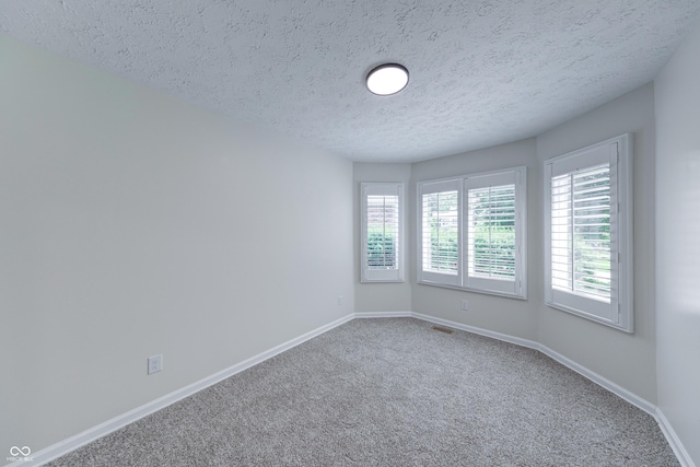 8178 Foxchase Cir, Indianapolis, IN 46256 - empty room with carpet flooring and a textured ceiling