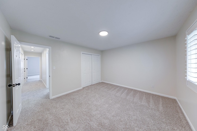 8178 Foxchase Cir, Indianapolis, IN 46256 - unfurnished bedroom with carpet floors and a closet