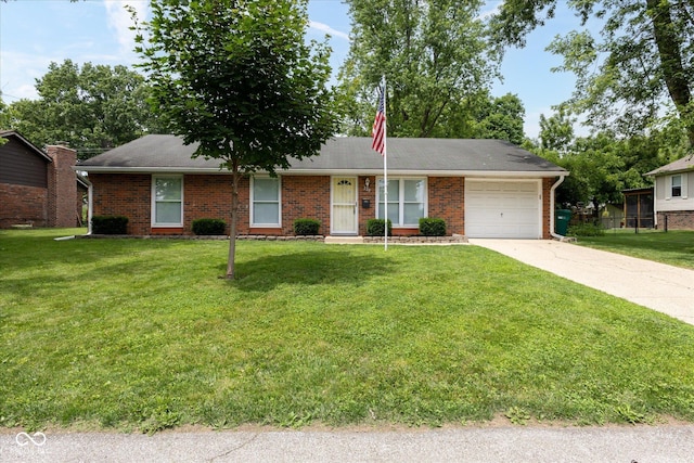 220 E Tilden Dr, Brownsburg, IN 46112 - ranch-style house featuring a garage, driveway, and a front lawn
