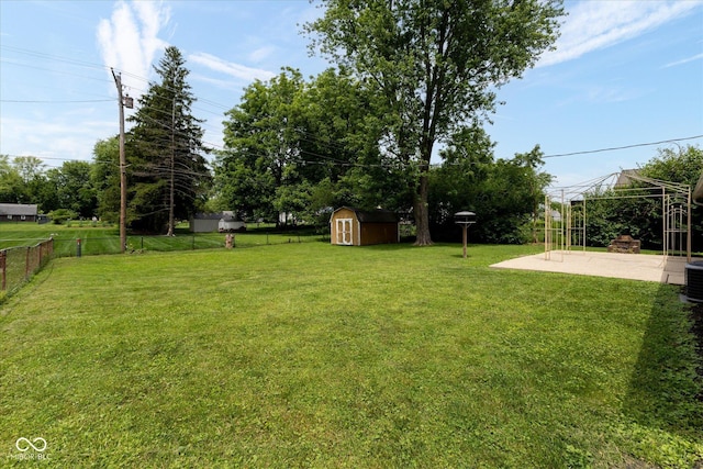220 E Tilden Dr, Brownsburg, IN 46112 - view of yard featuring a gazebo, a storage shed, and a patio area
