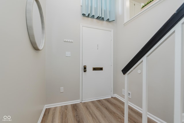 49 Druid Hill Ct Unit 0, Carmel, IN 46032 - foyer entrance with light wood finished floors and baseboards
