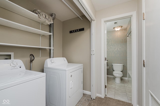49 Druid Hill Ct Unit 0, Carmel, IN 46032 - laundry area featuring washer and clothes dryer and light tile patterned floors