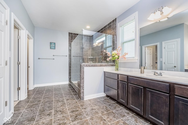 12634 Mustard Seed Ct, Fishers, IN 46038 - bathroom featuring tiled shower and vanity