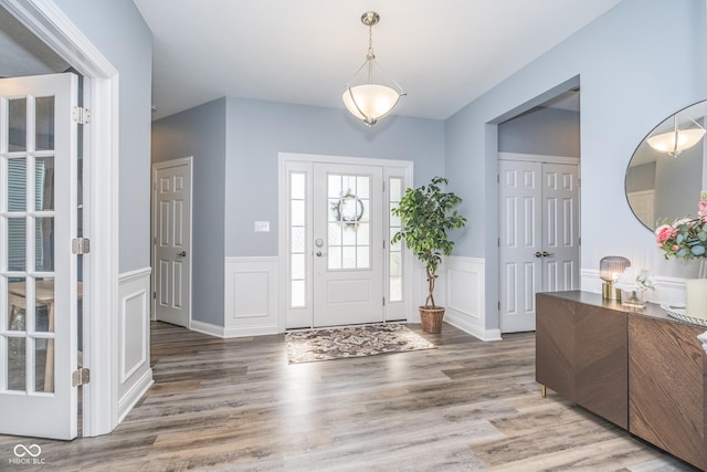 12634 Mustard Seed Ct, Fishers, IN 46038 - entrance foyer with wood finished floors and a wainscoted wall