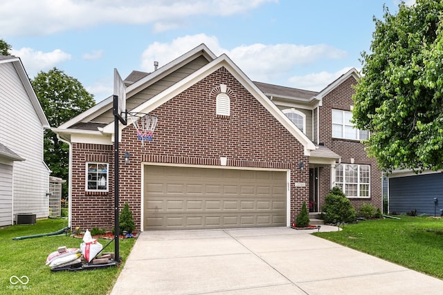 13700 Stanford Dr, Carmel, IN 46074 - traditional home featuring brick siding, a garage, concrete driveway, and a front yard