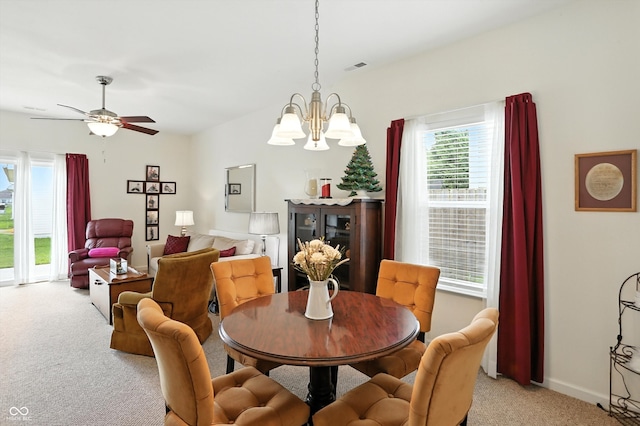 2253 Bridlewood Dr, Franklin, IN 46131 - dining area with light colored carpet, a chandelier, and a ceiling fan