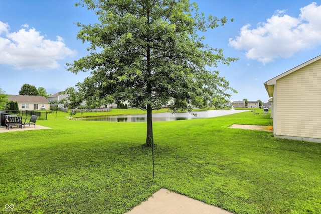 2253 Bridlewood Dr, Franklin, IN 46131 - view of grassy yard featuring a water view and a patio
