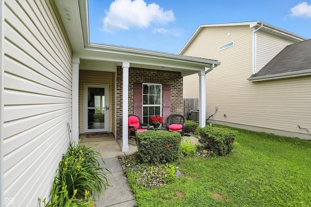 2253 Bridlewood Dr, Franklin, IN 46131 - doorway to property with a lawn, brick siding, and a porch