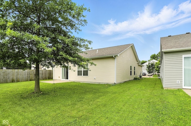 2253 Bridlewood Dr, Franklin, IN 46131 - back of house featuring a patio area and roof with shingles