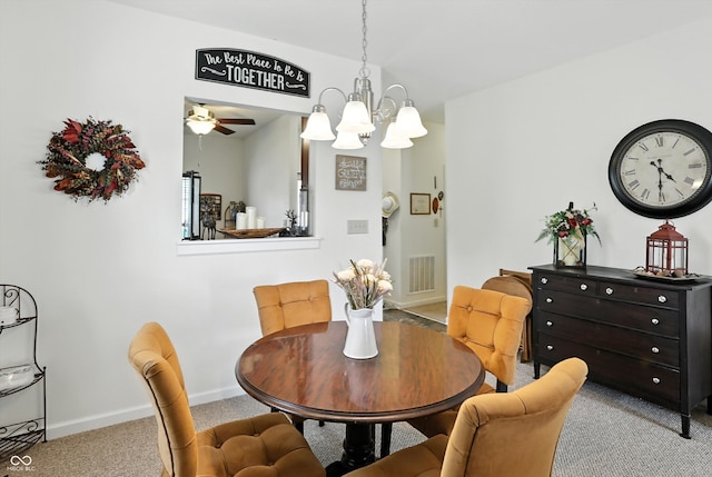 2253 Bridlewood Dr, Franklin, IN 46131 - carpeted dining room with a chandelier and ceiling fan