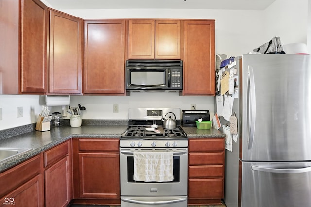2253 Bridlewood Dr, Franklin, IN 46131 - kitchen with appliances with stainless steel finishes and dark countertops
