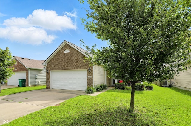 2253 Bridlewood Dr, Franklin, IN 46131 - view of front of home featuring brick siding, a garage, concrete driveway, and a front yard