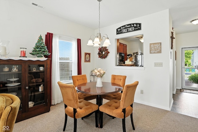 2253 Bridlewood Dr, Franklin, IN 46131 - dining room with carpet flooring, a chandelier, and ceiling fan