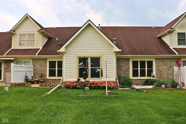 650 S Eagles Way, Crawfordsville, IN 47933 - view of front facade with brick siding and a front yard