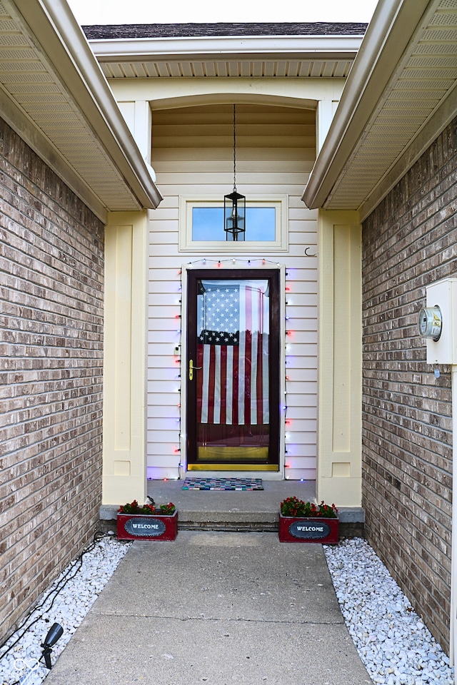 650 S Eagles Way, Crawfordsville, IN 47933 - view of exterior entry featuring brick siding