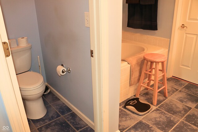 650 S Eagles Way, Crawfordsville, IN 47933 - bathroom featuring tile patterned floors and a tub to relax in