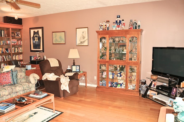 650 S Eagles Way, Crawfordsville, IN 47933 - living area featuring wood finished floors and a ceiling fan