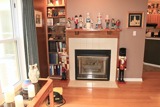 650 S Eagles Way, Crawfordsville, IN 47933 - living area with wood finished floors and a tile fireplace