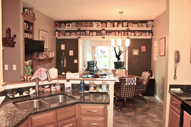650 S Eagles Way, Crawfordsville, IN 47933 - kitchen featuring dark stone countertops and electric range