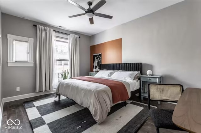 213 E 15th St, Indianapolis, IN 46202 - bedroom featuring wood finished floors and a ceiling fan