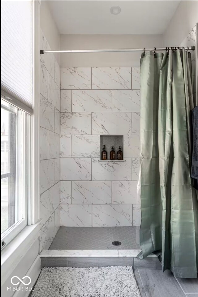 213 E 15th St, Indianapolis, IN 46202 - bathroom with tiled shower and healthy amount of natural light