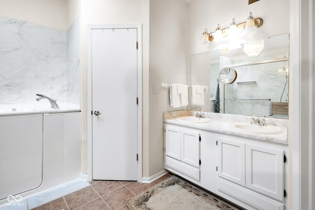 6439 Bower Dr, Indianapolis, IN 46241 - full bath with double vanity, a garden tub, a marble finish shower, and tile patterned floors