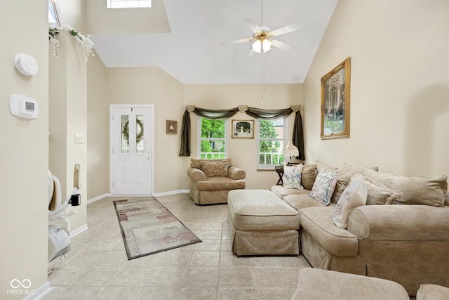 6439 Bower Dr, Indianapolis, IN 46241 - living room with ceiling fan, light tile patterned floors, and high vaulted ceiling