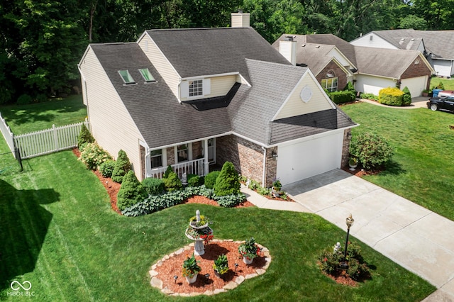 6439 Bower Dr, Indianapolis, IN 46241 - view of front of home featuring stone siding, driveway, a chimney, covered porch, and roof with shingles