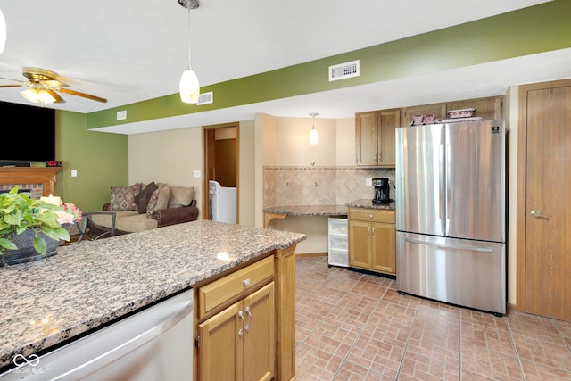 6439 Bower Dr, Indianapolis, IN 46241 - kitchen featuring freestanding refrigerator, dishwasher, tasteful backsplash, a ceiling fan, and decorative light fixtures
