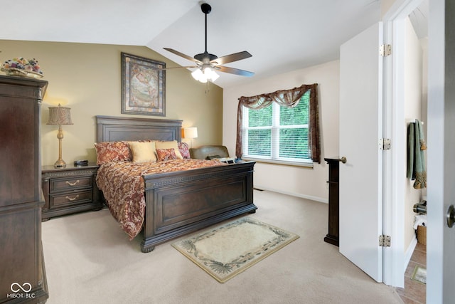 6439 Bower Dr, Indianapolis, IN 46241 - bedroom with light colored carpet, lofted ceiling, and a ceiling fan