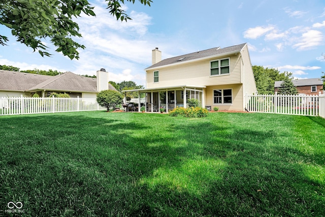 6439 Bower Dr, Indianapolis, IN 46241 - rear view of property with a fenced backyard, a chimney, and a patio