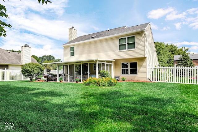 6439 Bower Dr, Indianapolis, IN 46241 - back of house featuring a patio, a fenced backyard, and a chimney