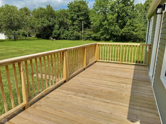 405 E Cowing Dr, Muncie, IN 47303 - wooden terrace featuring a yard and view of scattered trees