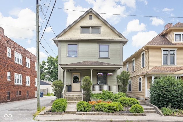 519 Sutherland Ave, Indianapolis, IN 46205 - traditional style home with a porch