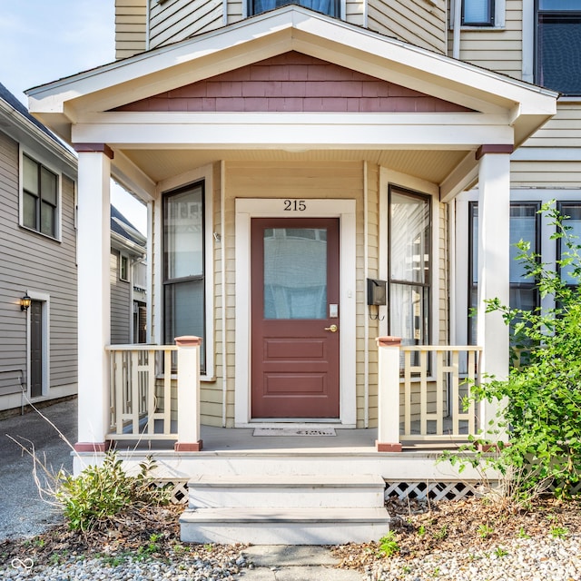 215 E 15th St, Indianapolis, IN 46202 - view of exterior entry with a porch