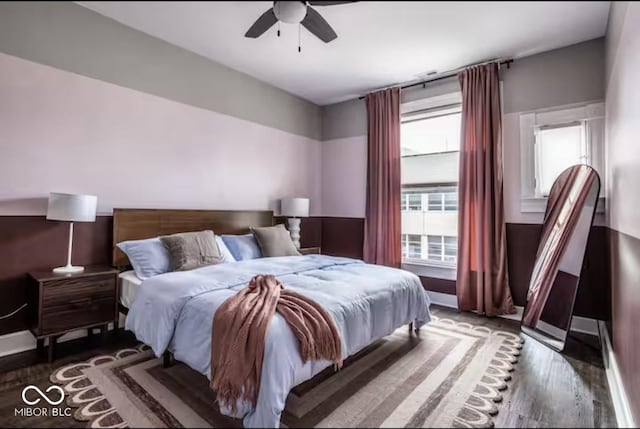 215 E 15th St, Indianapolis, IN 46202 - bedroom featuring wood finished floors and ceiling fan