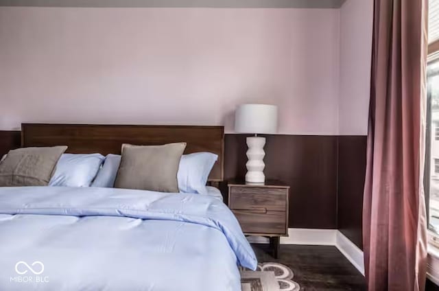 215 E 15th St, Indianapolis, IN 46202 - bedroom featuring wood finished floors and baseboards