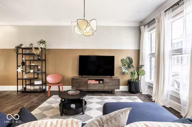 215 E 15th St, Indianapolis, IN 46202 - living room featuring crown molding and wood finished floors