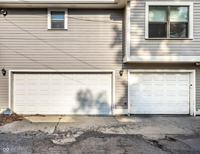215 E 15th St, Indianapolis, IN 46202 - garage with concrete driveway
